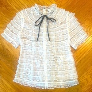 LIKE NEW! Sandro white lace top w/black tie. Only worn once.